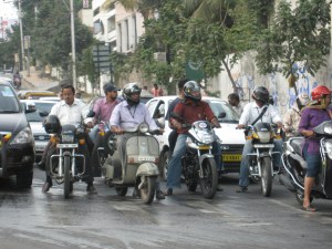 Motorcycle riders generally wearing helmets